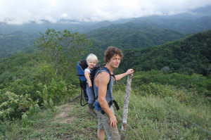 Father hiking with young son