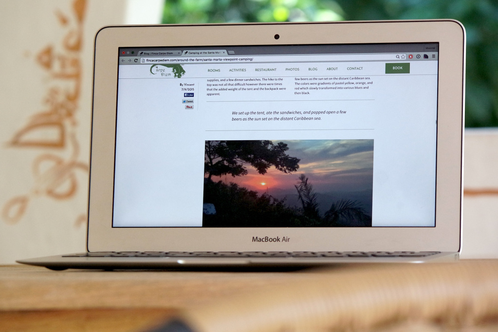 Finca Carpe Diem's website on a laptop screen